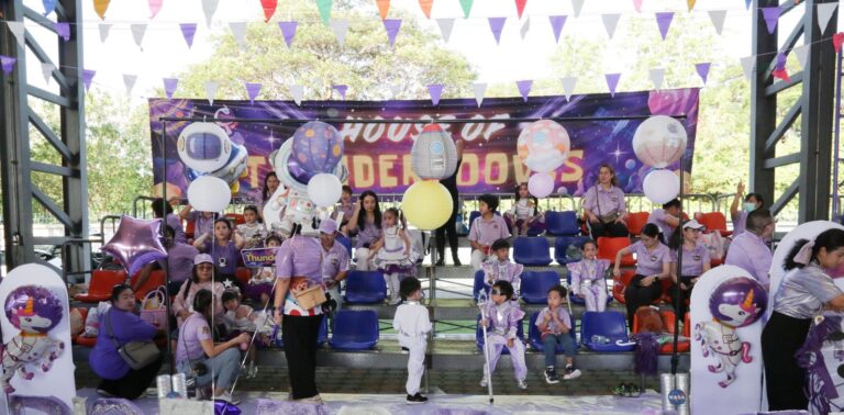 The House of Thunderhooves stage with purple banners and balloons