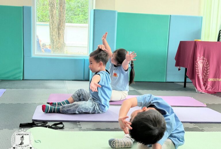 Preschool children stretching on yoga mats in the Zen Zest hub