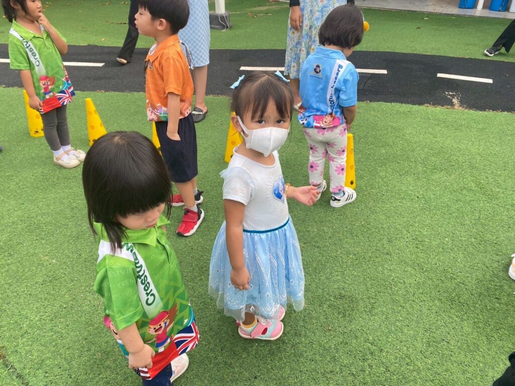 Preschool children playing outdoors